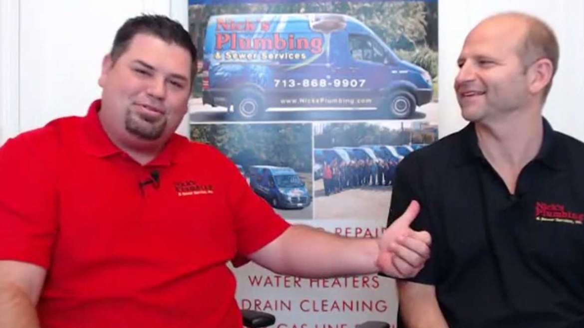 Two of Nick's Plumbing Experts in Houston Talking and Laughing