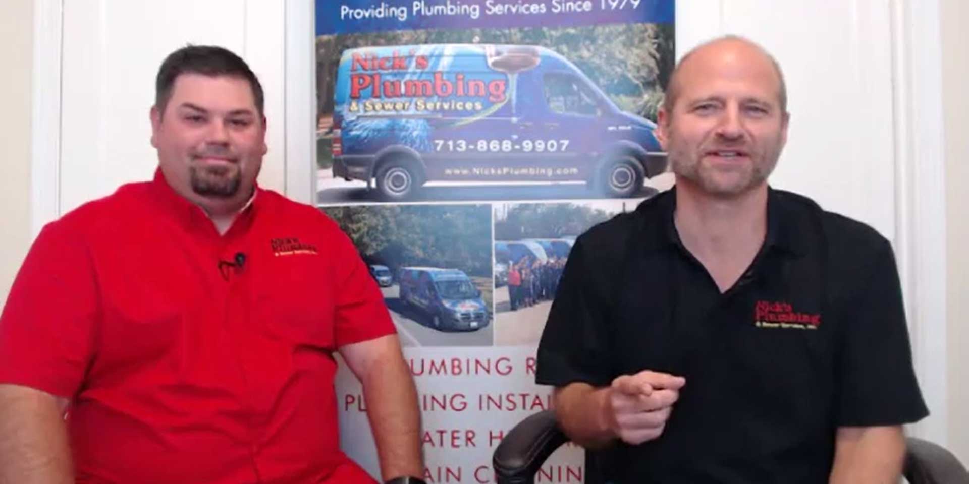 Two of Nick's Plumbing Experts in Houston Talking and Laughing