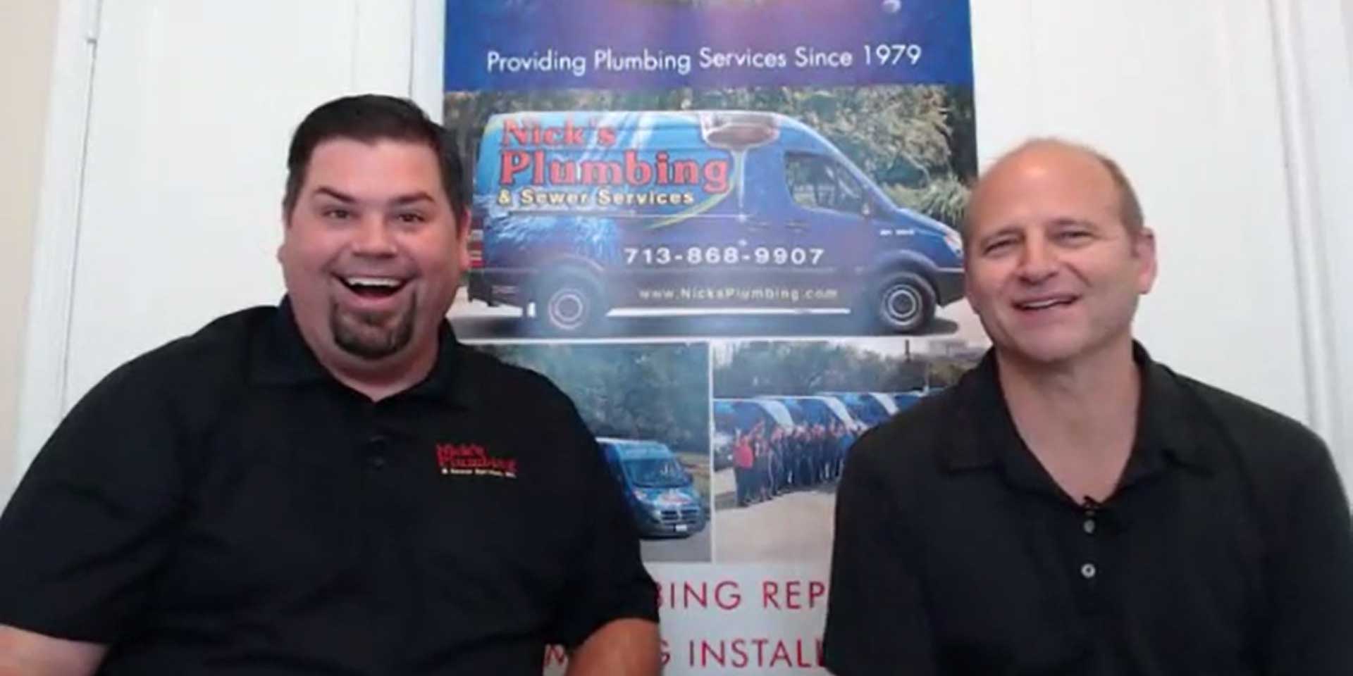 Two of Nick's Plumbing Experts in Houston Talking Excitedly