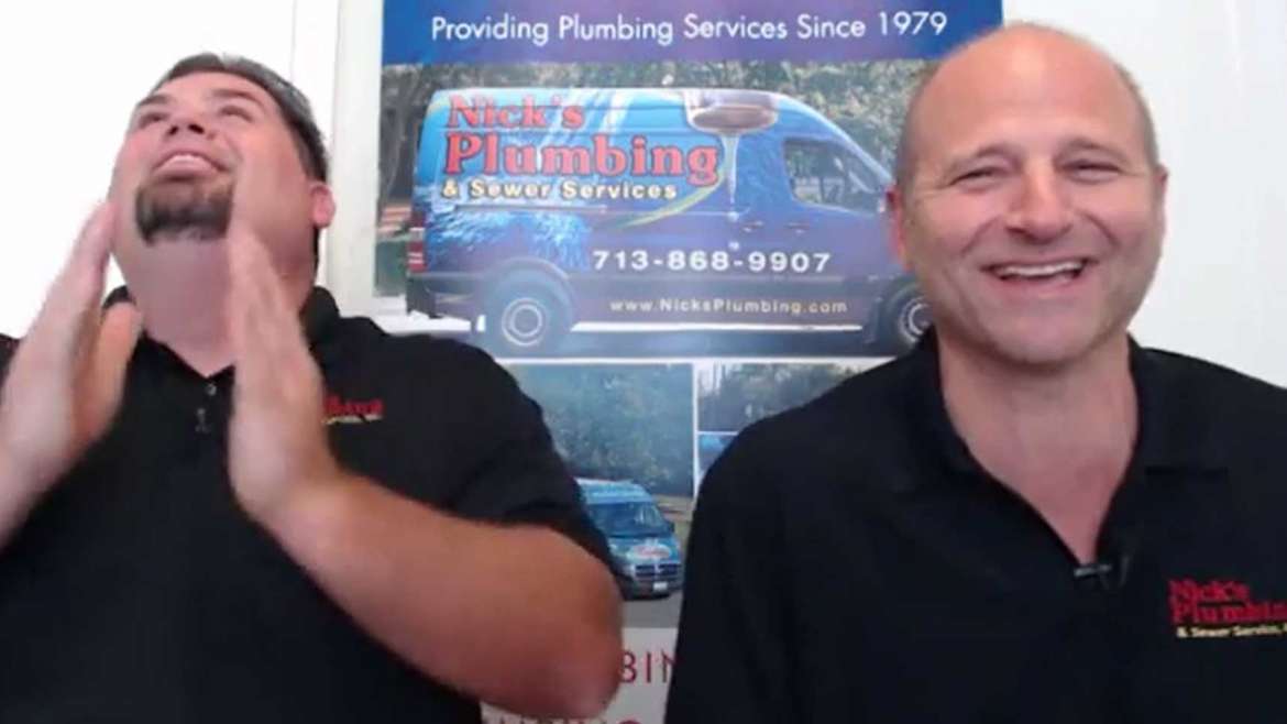 Two of Nick's Plumbing Experts in Houston Talking and Laughing