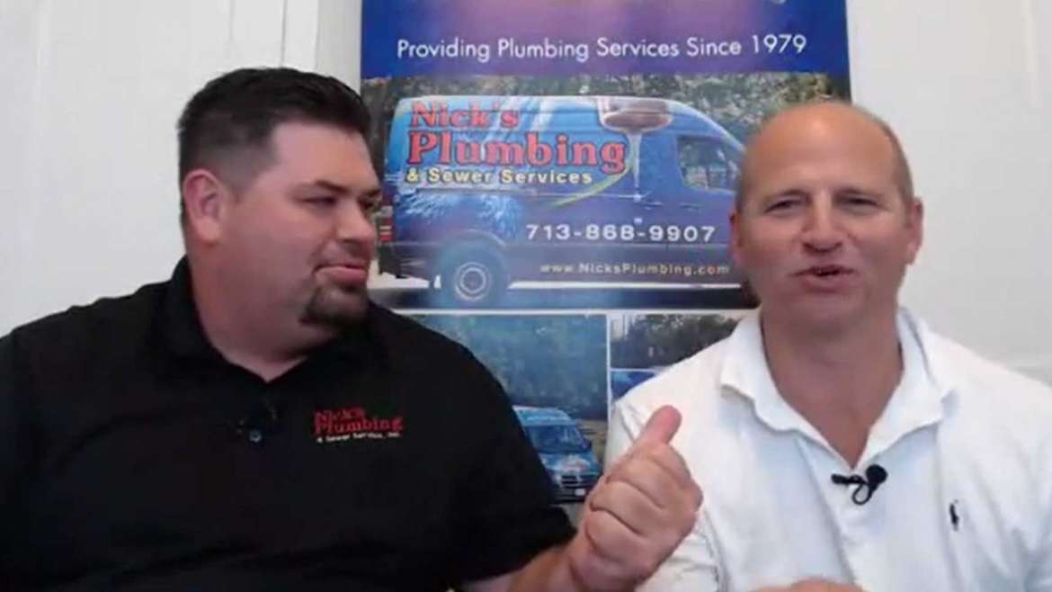 Two of Nick's Plumbing Experts in Houston Talking and Smiling