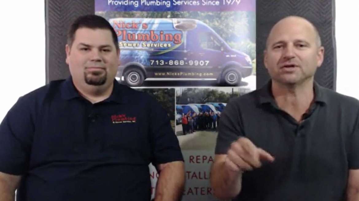 Two of Nick's Plumbing Experts in Houston Talking and Smiling