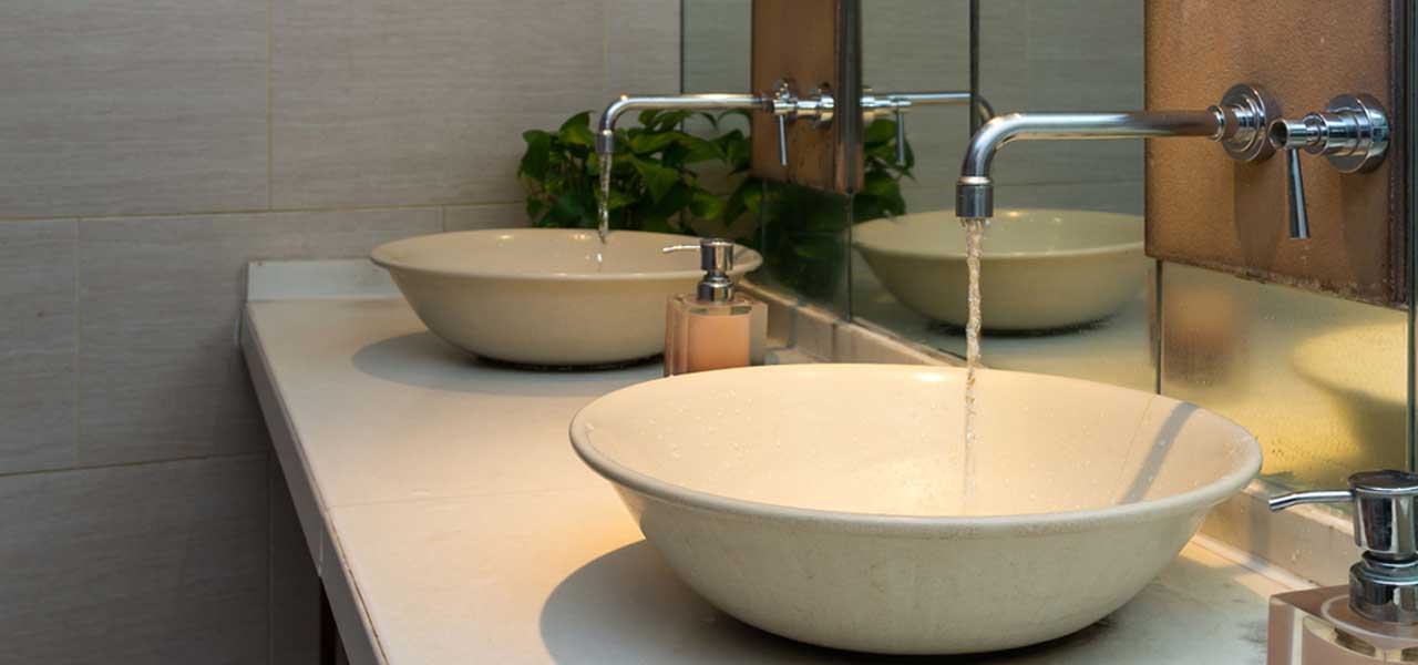 Two Bathroom Sinks with Faucets