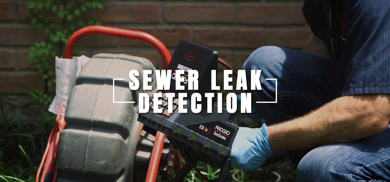 Professional Plumber Working to Detect a Sewer Leak